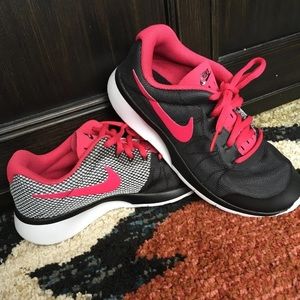 Nike pink and black athletic sneakers
